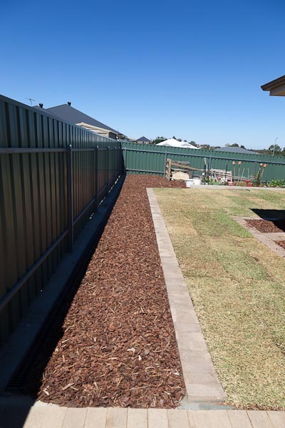 All mulched along the fence, ready for some plants!
